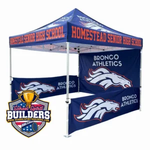 School administrator setting up custom pop-up tent with aluminum frame and branded canopy for outdoor school event by School Spirit Builders, Florida